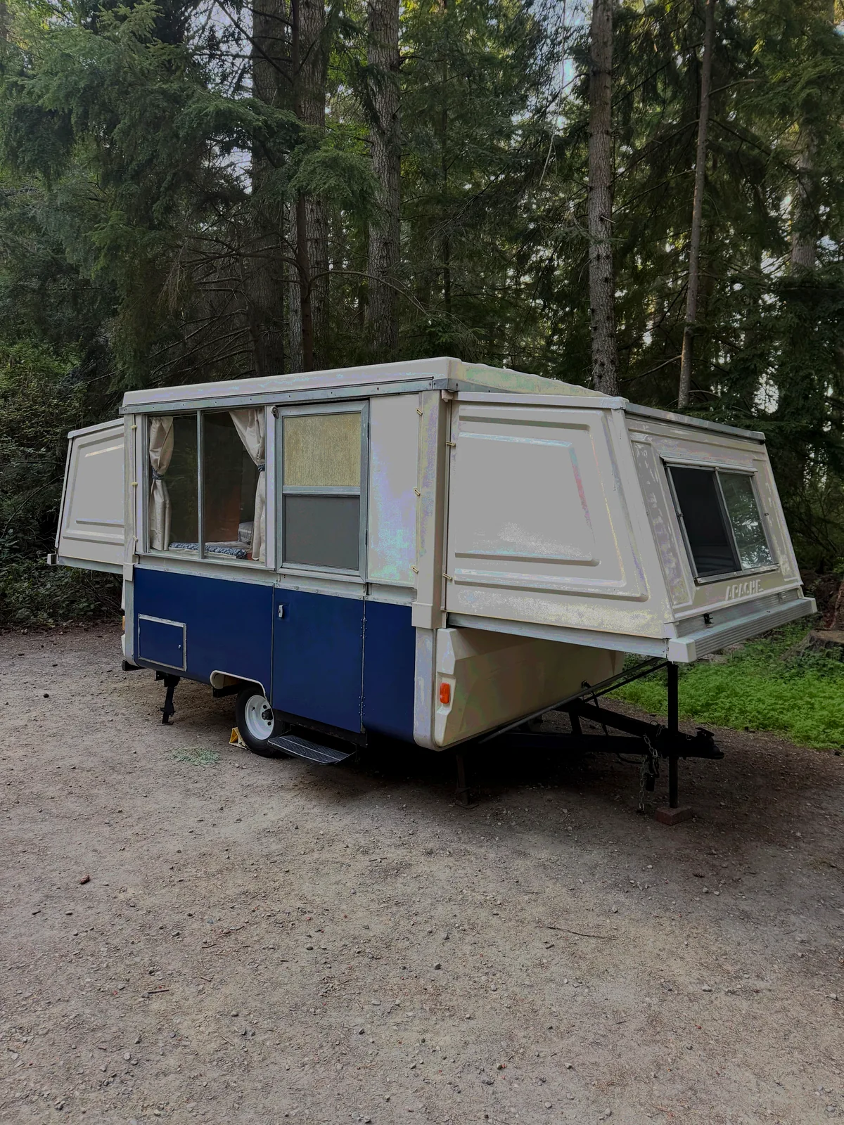1977 Apache Mesa trailer exterior in forest