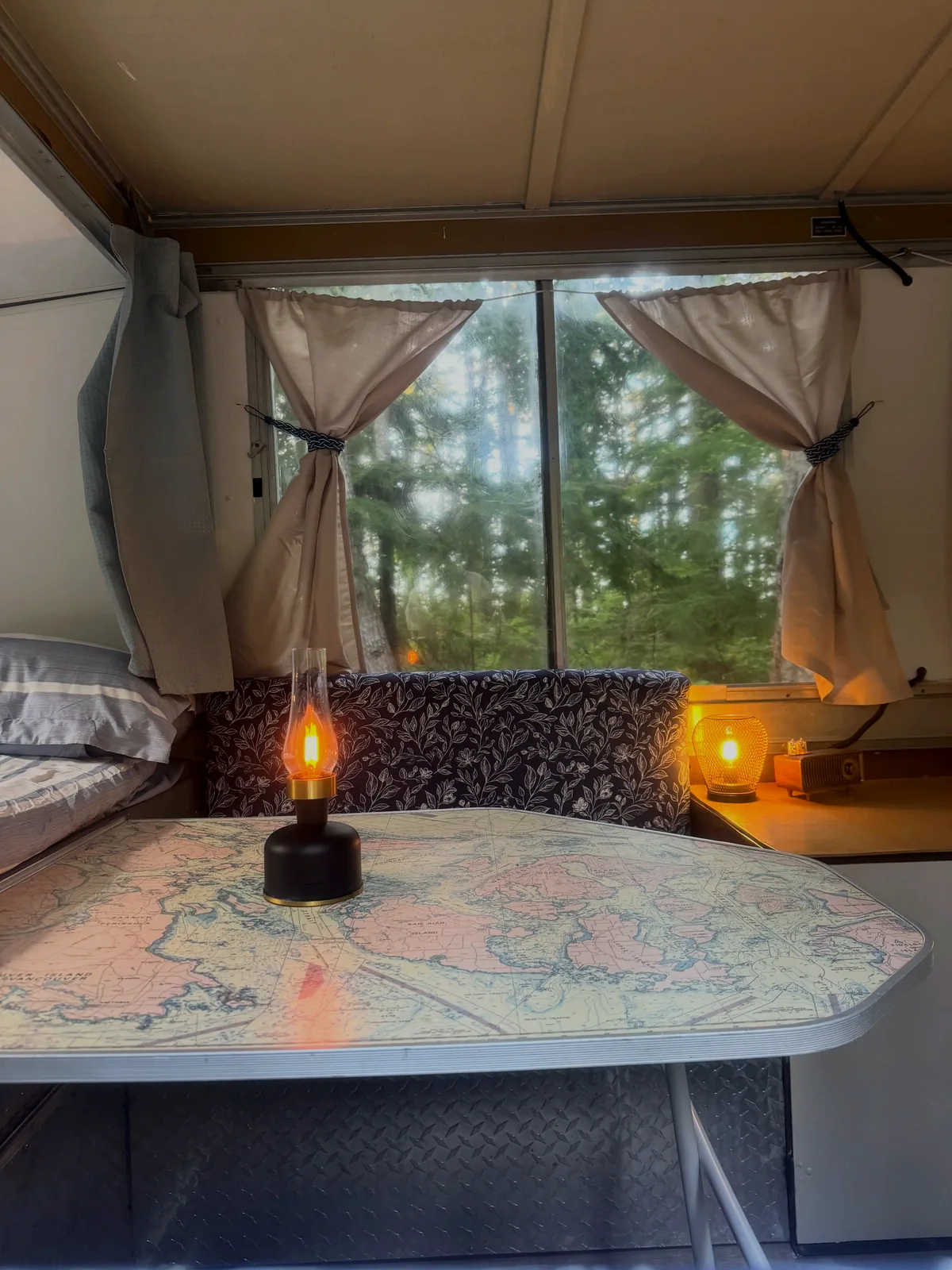 Cozy interior with map table and lanterns